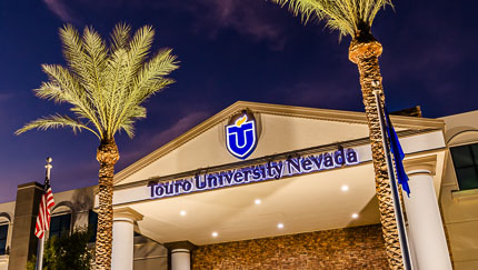 Exterior of the Touro University Nevada building, featuring the university logo