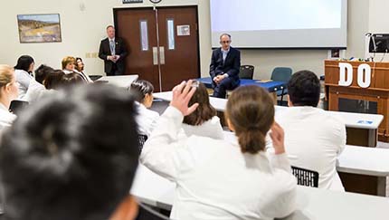 Students in a lecture hall.